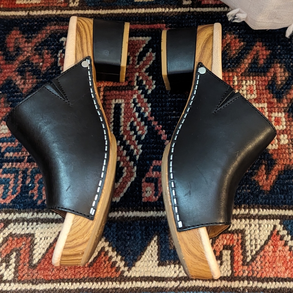 Dansko black leather clogs